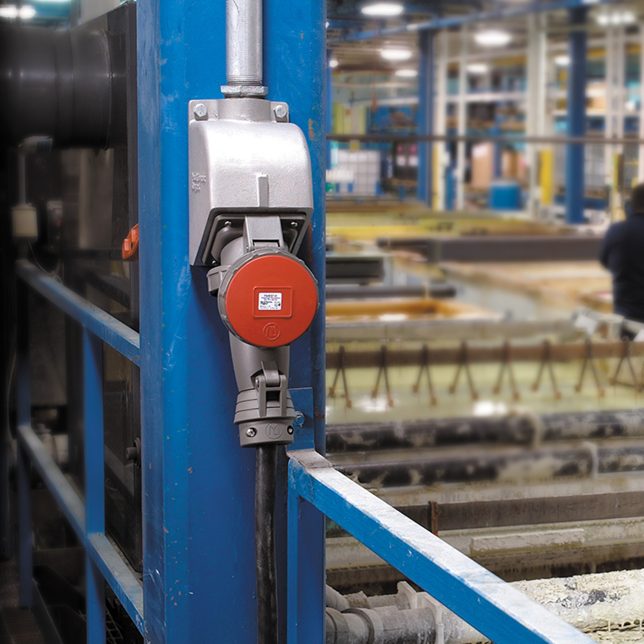 iec pin and sleeve placed into metal beam